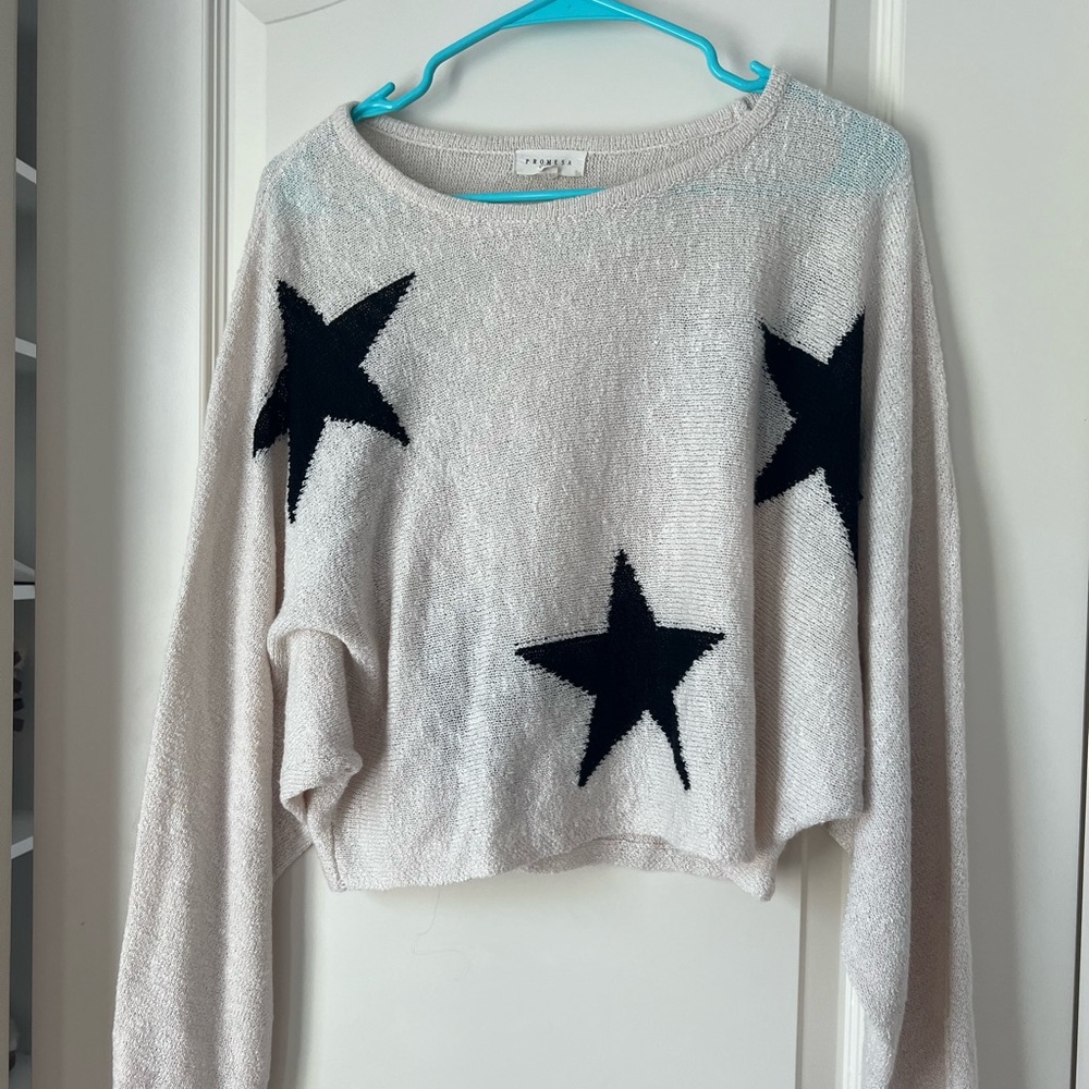 Cream sweater with black stars